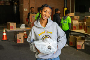 Celebrating Five Years of Partnership: WFF Volunteer Corps and Hudson Grille Deliver Thanksgiving Joy